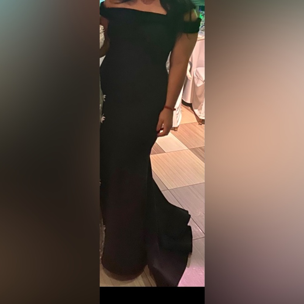 Off shoulder form fitting floor length gown